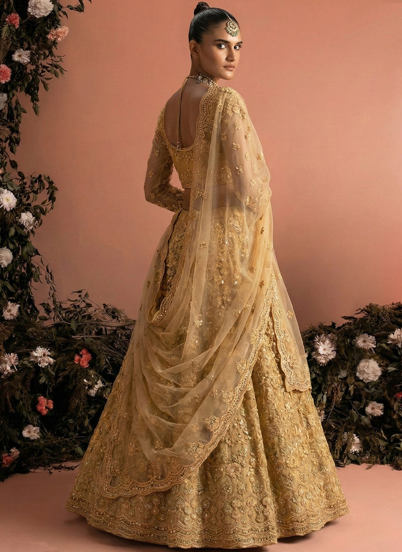 Beige Net Heavy Embroidered Wedding Lehenga