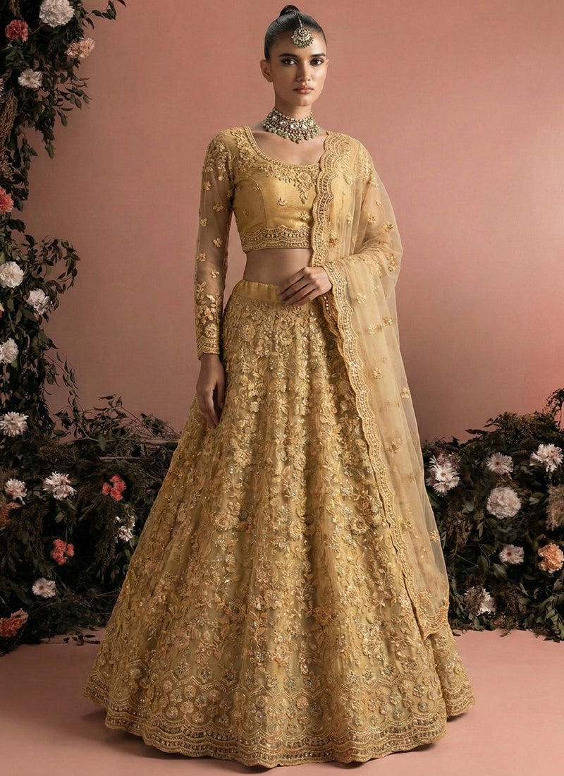 Beige Net Heavy Embroidered Wedding Lehenga