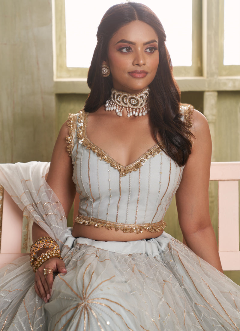 Off White Butterfly Net Thread Sequins Lehenga Choli